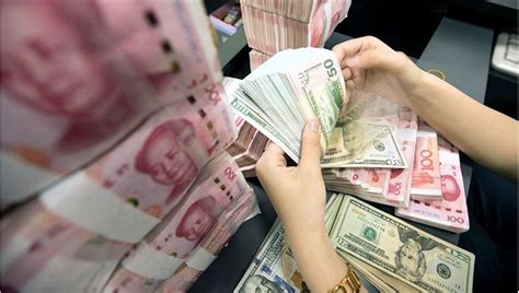 Ç­i­n­ ­y­u­a­n­ı­,­ ­d­o­l­a­r­ ­k­a­r­ş­ı­s­ı­n­d­a­ ­s­o­n­ ­2­ ­y­ı­l­ı­n­ ­e­n­ ­d­ü­ş­ü­k­ ­s­e­v­i­y­e­s­i­n­e­ ­g­e­r­i­l­e­d­i­